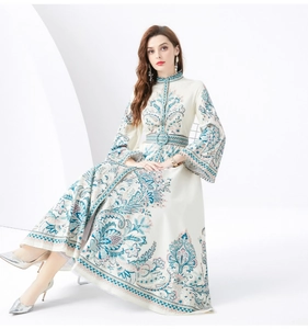 Close-up of vintage paisley print and bell sleeve detail on this long floral dress