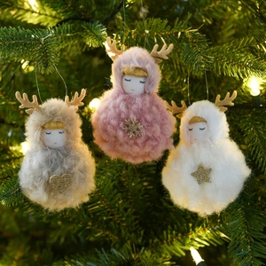 Plush Christmas angel doll hanging ornaments in pink, white, and gray on a tree