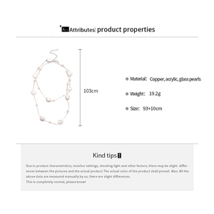 Detailed view of long multilayer necklace with acrylic glass pearls and copper chain