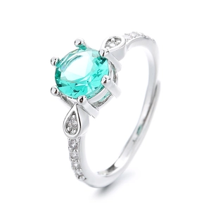 Silver adjustable open ring featuring a large round green gemstone with pavé zircon setting