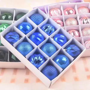 16-pack royal blue Christmas tree ornaments with matte and glitter finishes in a white box
