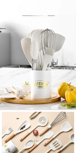 Detail of 12-piece white silicone kitchen utensils with wooden handles in storage bucket