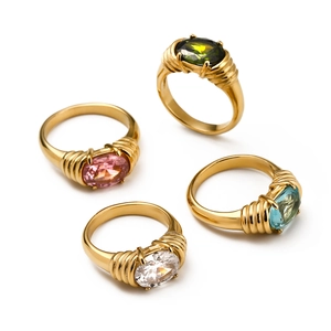18k gold plated stainless steel rings with ribbed texture and colorful oval crystals