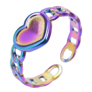 Macro shot of iridescent oil slick heart ring with hollow chain band design