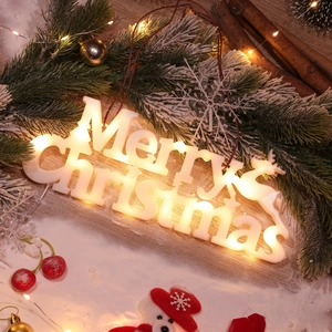 Luminous Merry Christmas LED sign with reindeer and snowflake on rustic wooden base