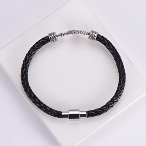 Classic braided black leather bracelet with silver magnetic stainless steel clasp on stone