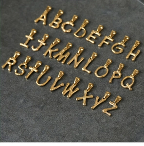 Detailed set of 26 gold 18K titanium steel alphabet pendants in bamboo texture style