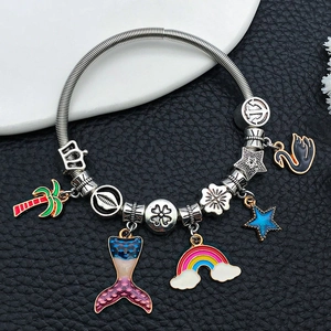 Silver charm bracelet with colorful palm tree, shell and crown pendants on black leather