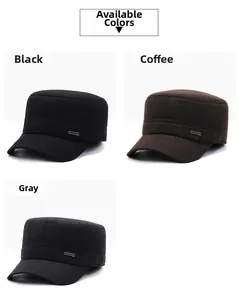 Detail of wool fabric texture and metal logo on men's winter flat top military caps