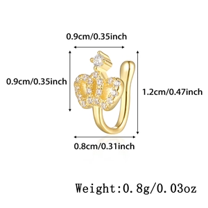 Macro view of a 925 silver gold-plated crown nose clip with sparkling cubic zirconia