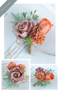 Detail of handmade wedding boutonniere with silk roses and twine-wrapped stem