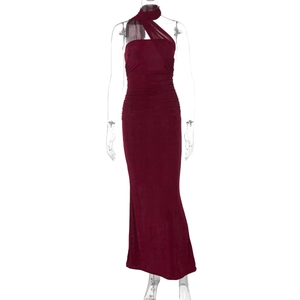 Detail of elegant dark red backless dress with a long ribbon and draped pleats