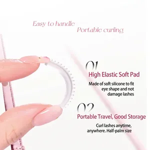 Portable pink eyelash curler with soft white silicone pad for precise eye lash curling