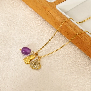 Golden titanium steel necklace with purple bead, small fish and rhinestone shell pendants