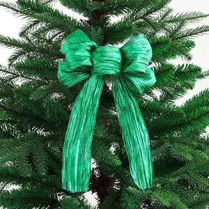 Green glitter fabric Christmas tree topper bow with metallic texture and long ribbons