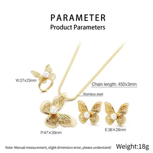 Macro detail of gold stainless steel butterfly jewelry set with pearls and dimensions