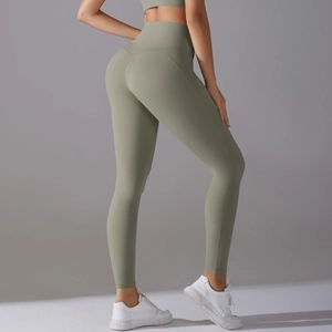 Detail view of high-waisted yoga leggings with V-seam stitching for butt-lifting effect