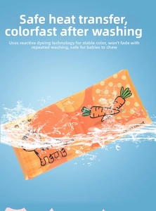 Washable baby cloth book with vibrant orange tiger patterns showing colorfast fabric quality