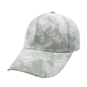 Detail view of the green tie-dye pattern on this breathable cotton baseball cap