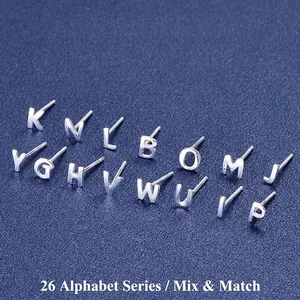 Minimalist S925 sterling silver alphabet stud earrings in polished silver finish