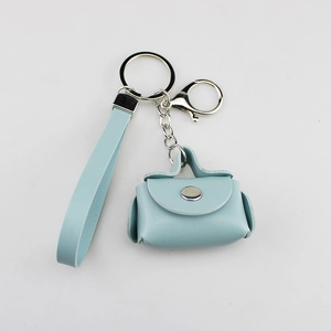 Light blue mini handbag keychain made of PU leather with silver metal lobster clasp