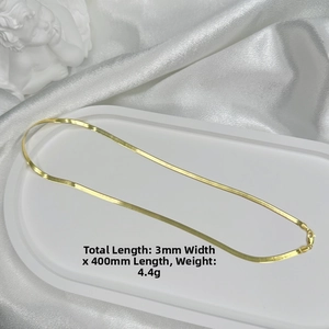 Detailed macro view of 3mm wide gold plated S925 sterling silver flat snake chain