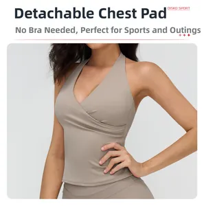 Detail of V-neck halter sports bra with removable padding and cross wrap design