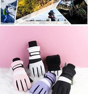 Close-up of waterproof winter gloves with plush lining and adjustable windproof buckles