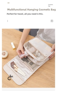 Close-up of beige hanging toiletry bag with mesh pockets and folding compartments