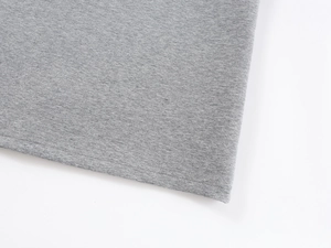 Detail of gray knitted skirt featuring professional double-needle stitching on the hemline