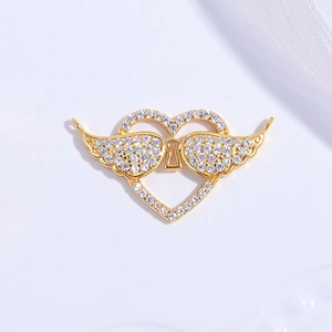 Exquisite S925 silver heart with wings pendant featuring sparkling crystals in gold
