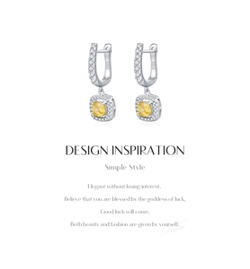 Detail of S925 sterling silver hoop earrings with yellow square stone and pave diamonds