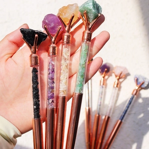 Rose gold metal ballpoint pens with natural crushed crystal stones in various colors