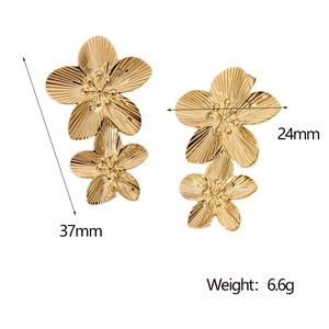 Detailed view of gold floral earrings with dimensions 37mm x 24mm and brushed texture