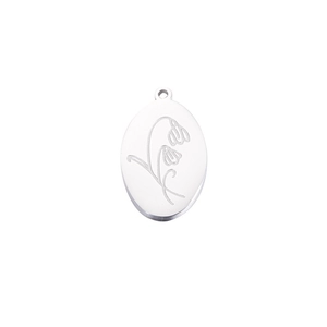 Detailed engraving of Lily of the Valley on an oval stainless steel birthday pendant