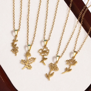 Detail showing five 18k gold plated stainless steel necklaces with floral pendants