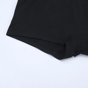 Detailed close-up showing double-needle stitching on black lace set shorts