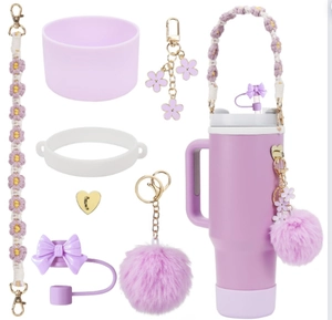 Purple accessories set for Stanley cup featuring silicone boot and floral straw covers