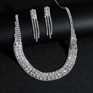 Luxurious silver copper bridal jewelry set with sparkling rhinestones for wedding dresses