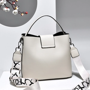 White litchi pattern bucket bag with wide letter-print strap and top handle