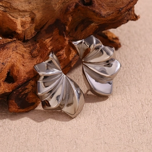 Minimalist silver pleated petal stud earrings with an abstract geometric fan design