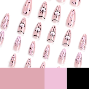 Pink evil eye press-on nails with snake print, flame patterns, and rhinestone accents