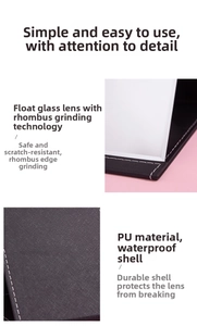 Close-up view of portable folding makeup mirror showing PU leather texture and edges