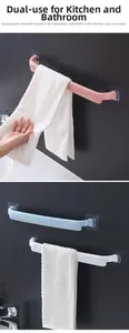 Adhesive wall-mounted towel rack in pink, blue, and white colors for kitchen or bathroom