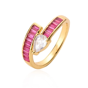 Gold plated geometric ring with pink rectangular gems and pear cut clear zircon