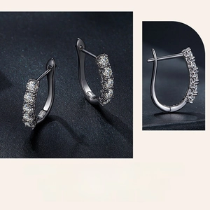 Detail showing S925 hallmark and hinge structure on gun black moissanite hoop earring