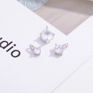 Three S925 sterling silver pendants with round zirconia in a 4-claw setting on a white card
