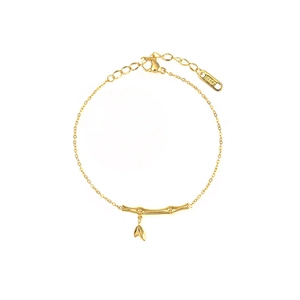 Minimalist 18k gold plated stainless steel bamboo link bracelet with leaf charm detail