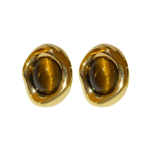 French vintage oval gold-plated earrings with brown cat-eye stones on white background