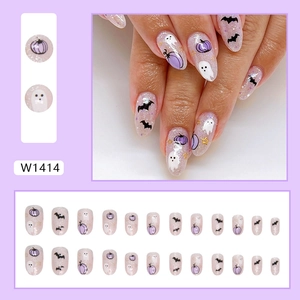 Short round Halloween press-on nails featuring purple pumpkin, bat, and ghost designs